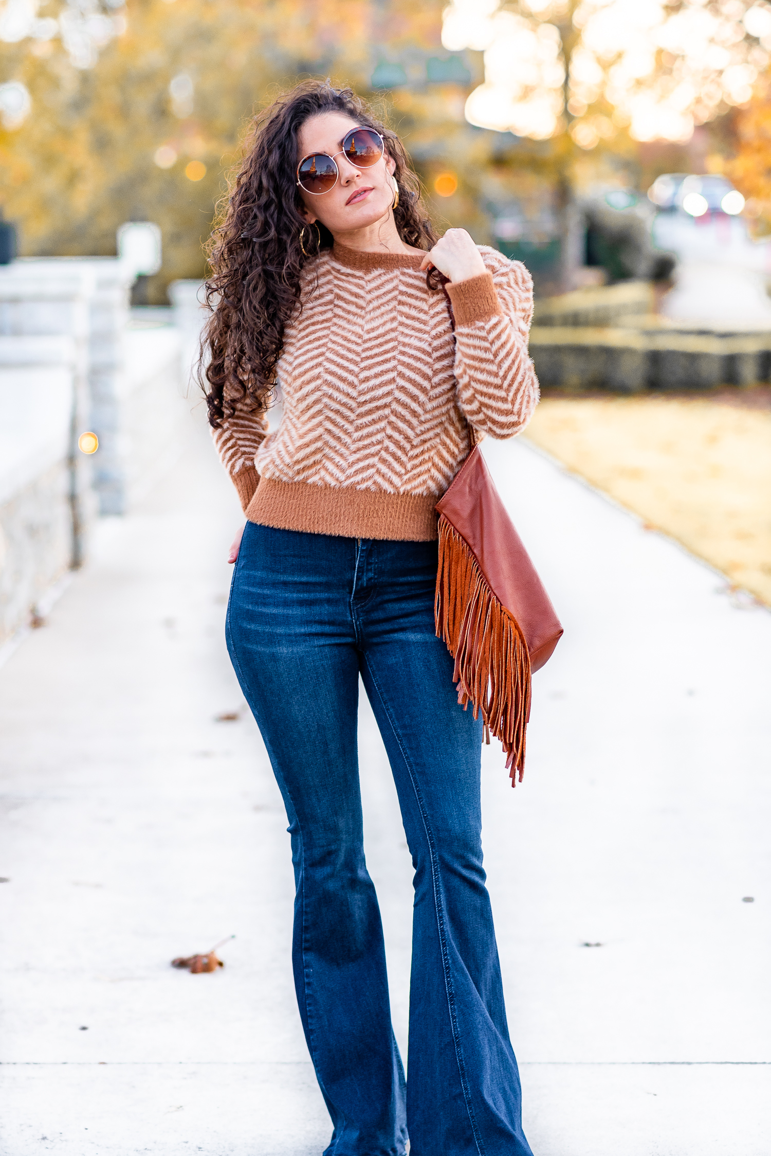 Black Bell Bottoms Outfit Ideas - Orange Hoodie with Black Bell Bottoms &  Boots Now, let's take a 180-degree turn and take a look at a more cheerful  and youthful look. To